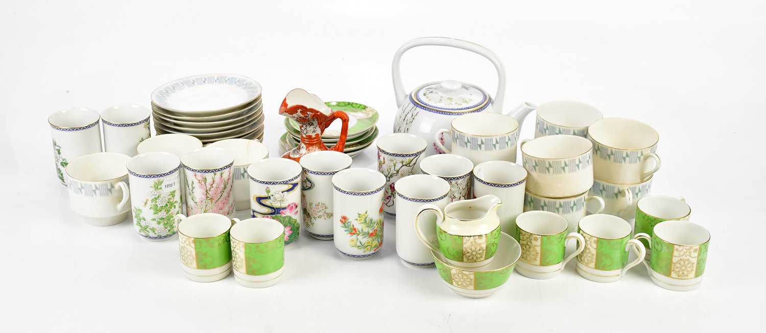 A decorative Chinese part tea service, a Japanese Kutani jug, modern Japanese beakers, etc.