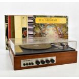 SINCLAIR; a 60s stereo together with an assortment of vinyl LP records. Condition Report: Electrical