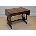 A Regency mahogany sofa table, with two real and two dummy drawers, on lyre shaped end supports, and