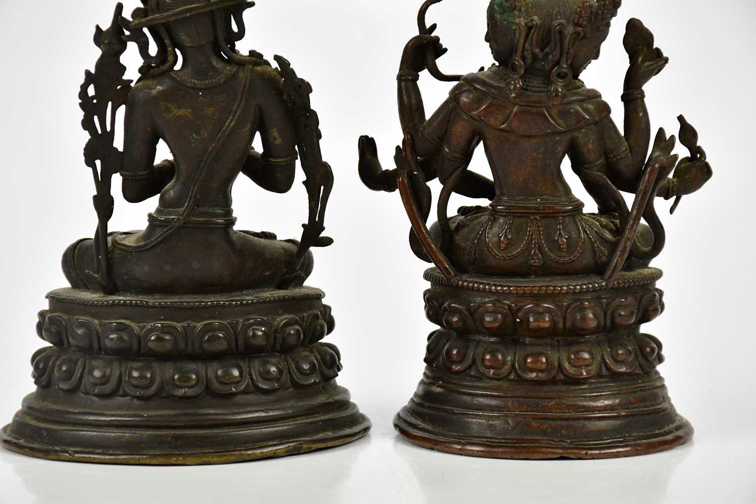 A Chinese bronze figure of Jnana Dakini, with six arms, on lotus base, height 14cm, with a similar - Image 8 of 22