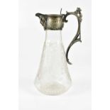 A late 19th/early 20th century etched glass claret jug with silver plated mounts and handle,