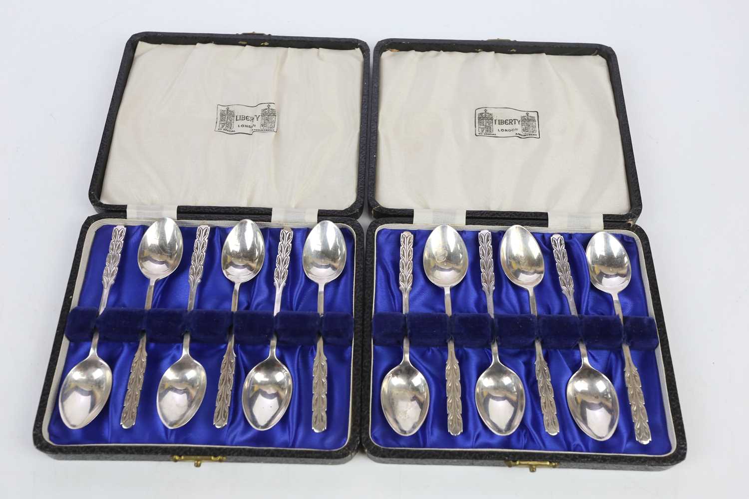 LIBERTY & CO; a set of twelve Elizabeth II hallmarked silver teaspoons with chased floral decoration