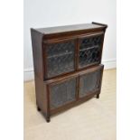 MINTY; a two tier bookcase with leaded glazed doors, length 89cm.