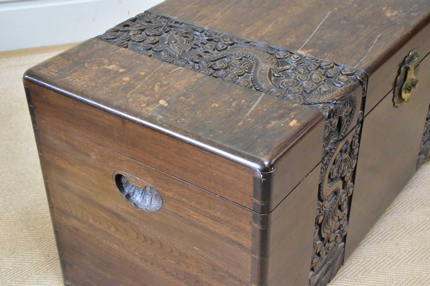 A Chinese carved camphor wood blanket box, height 53cm, width 101cm. - Image 3 of 4