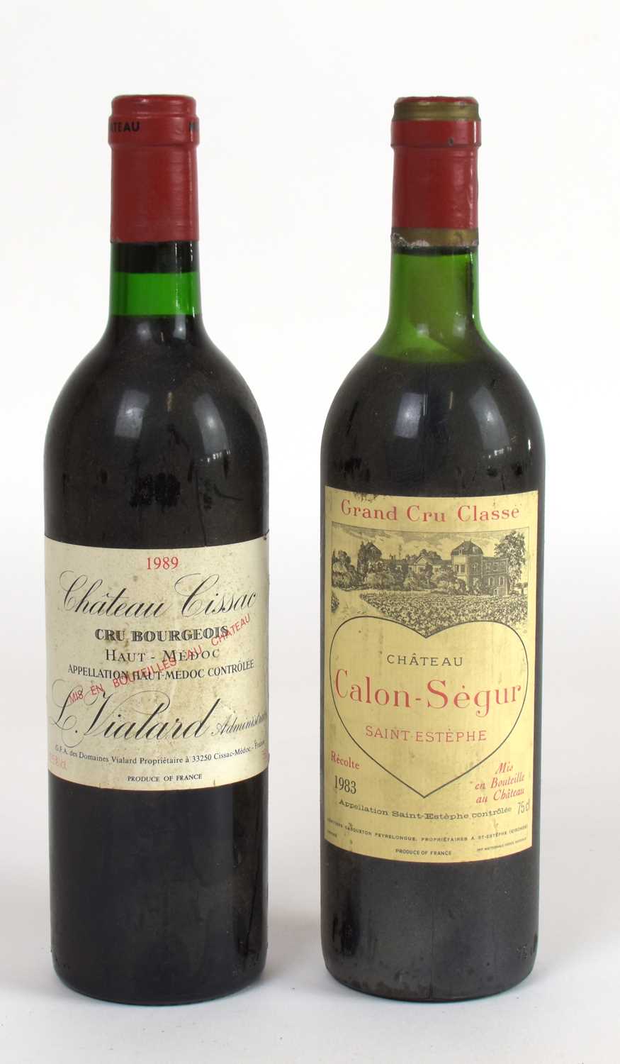 RED WINE; a bottle Château Calon-Segur Grand Cru Classe 1983 and a bottle Château Cissac 1989, 12.