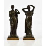 A pair of 19th century bronze figures representing classical females with flowing dresses, on plinth