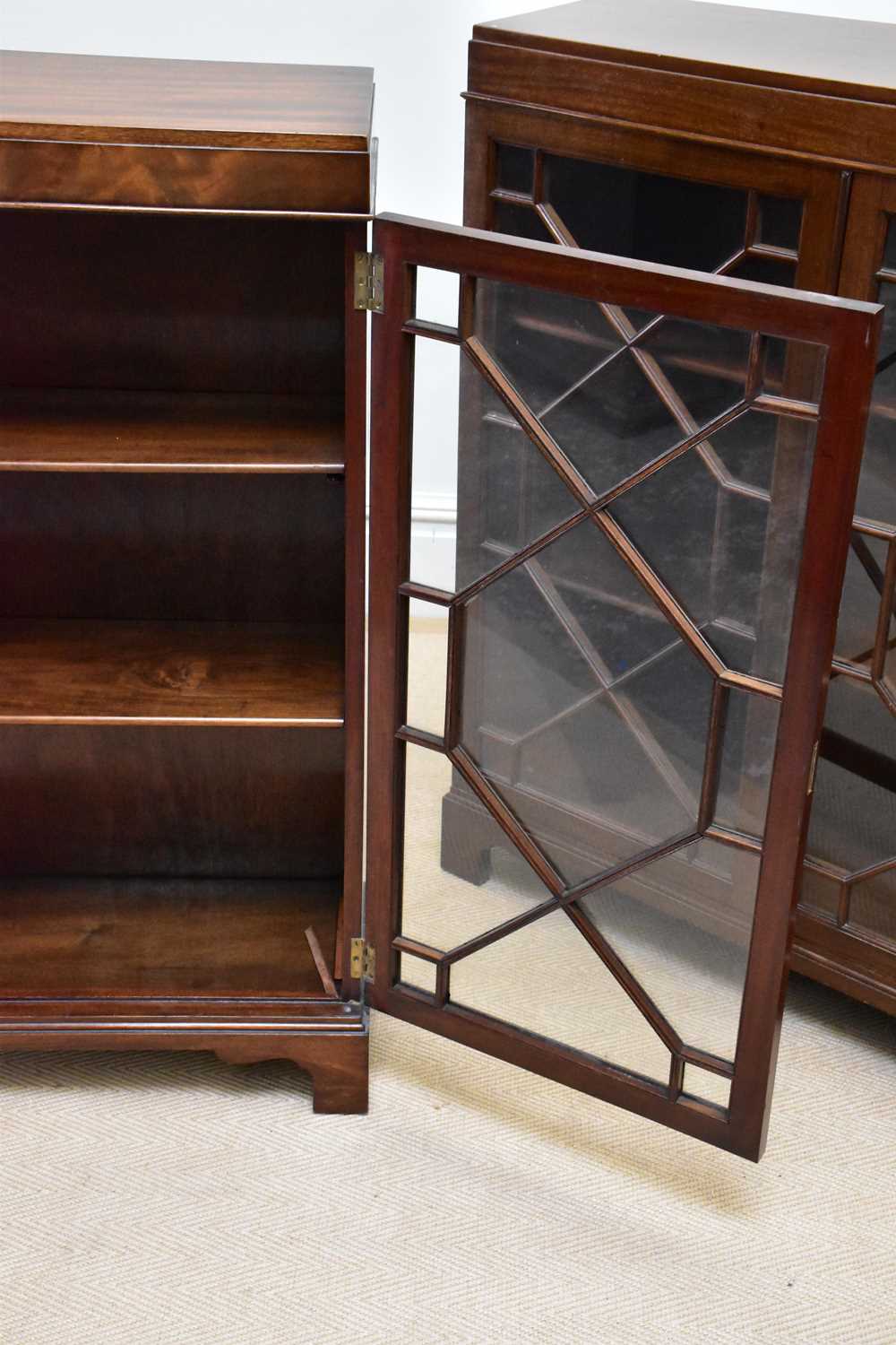 A pair of Waring & Gillow mahogany bookcases, each with astragal glazed doors, on bracket feet, - Image 2 of 3