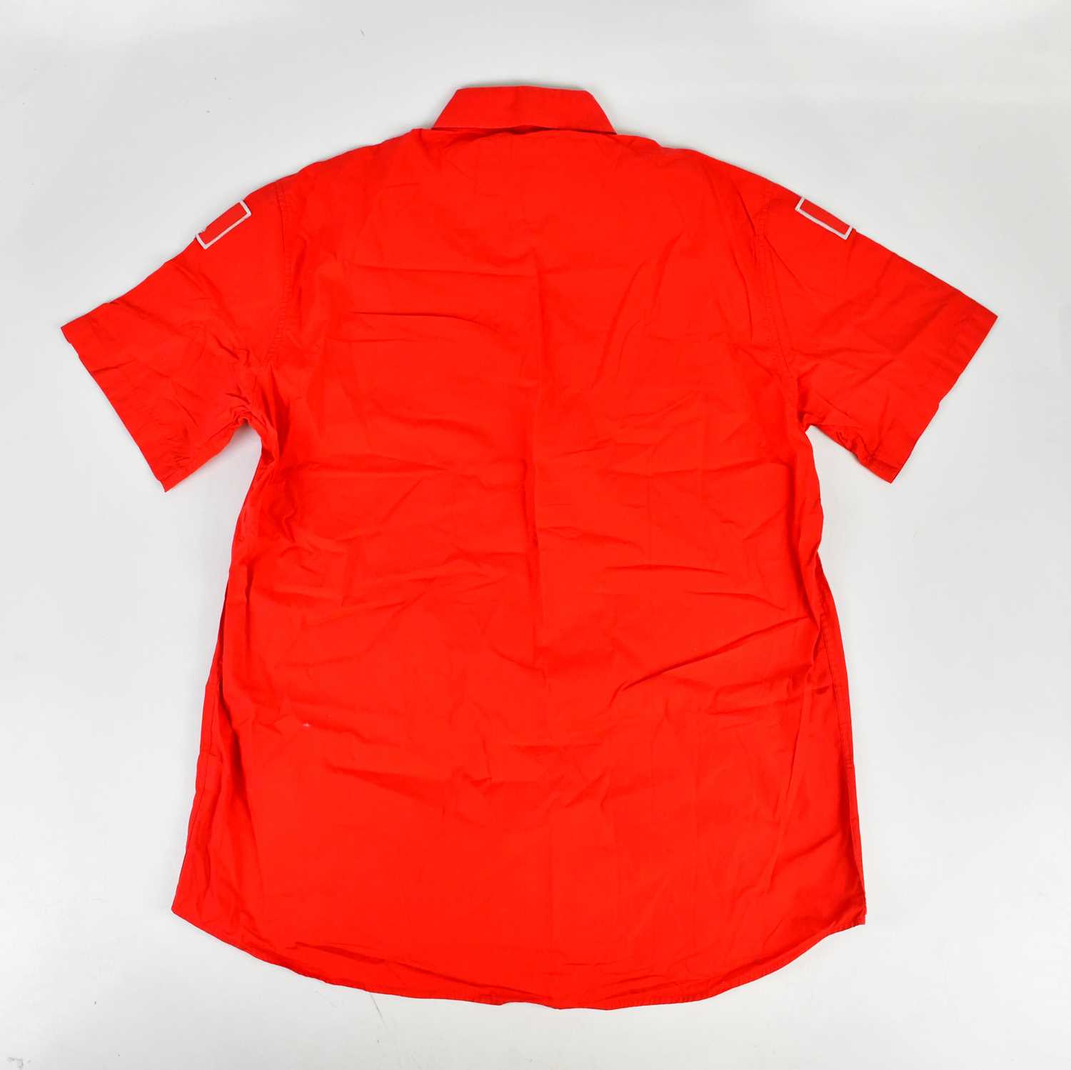 MICHAEL SCHUMACHER; a signed FILA Ferrari shirt, signed to the front, size XL. Condition Report: - Image 3 of 3