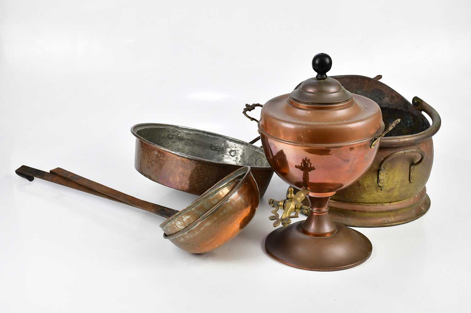 A small collection of metalware including copper tea urn, brass coal scuttle, copper pan, etc.