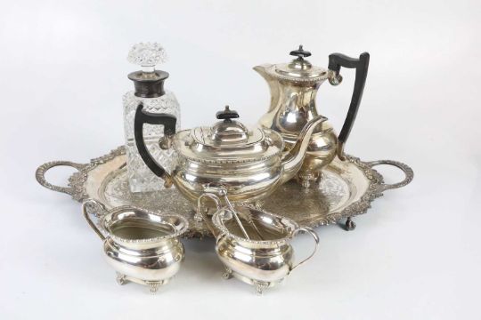 A silver plated four piece tea service with twin handled tray and cut glass decanter. - Image 1 of 5