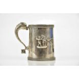 JOHN EMES; a George III hallmarked silver mug, with dolphin handle and cast borders within which