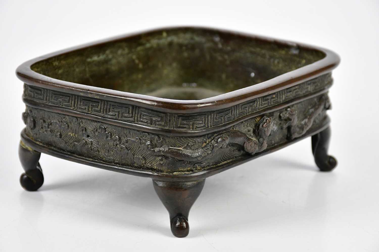 A late 19th century Japanese bronze bowl, with cast decoration of mythical beasts and Greek key - Image 3 of 7