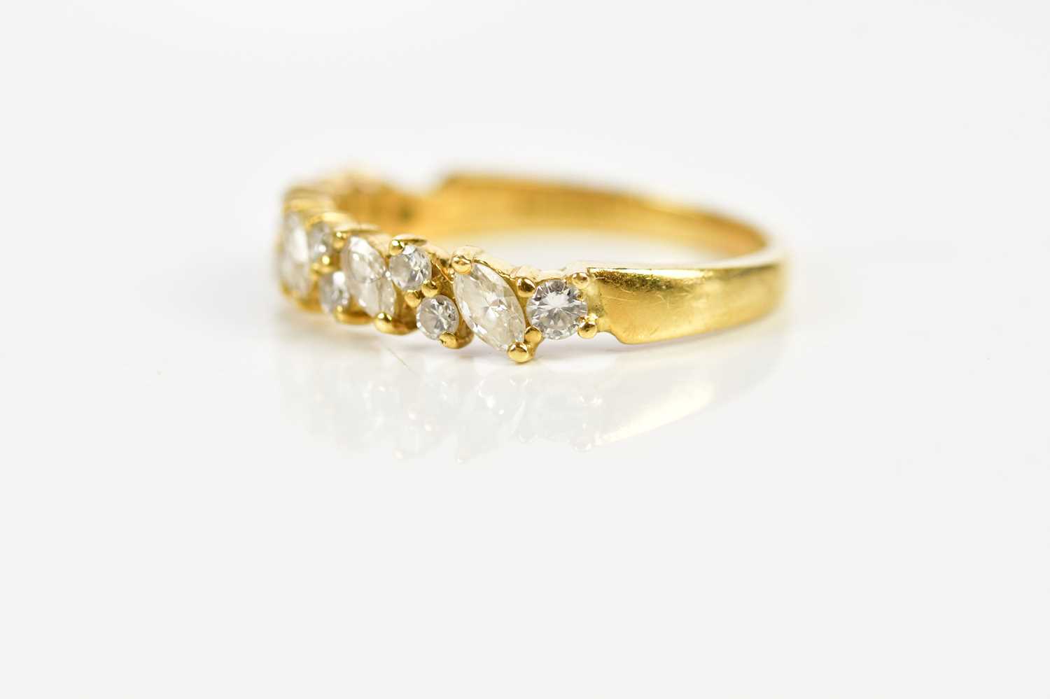 An 18ct yellow gold diamond set dress ring set with marquise and round brilliant cut diamonds, - Image 2 of 4