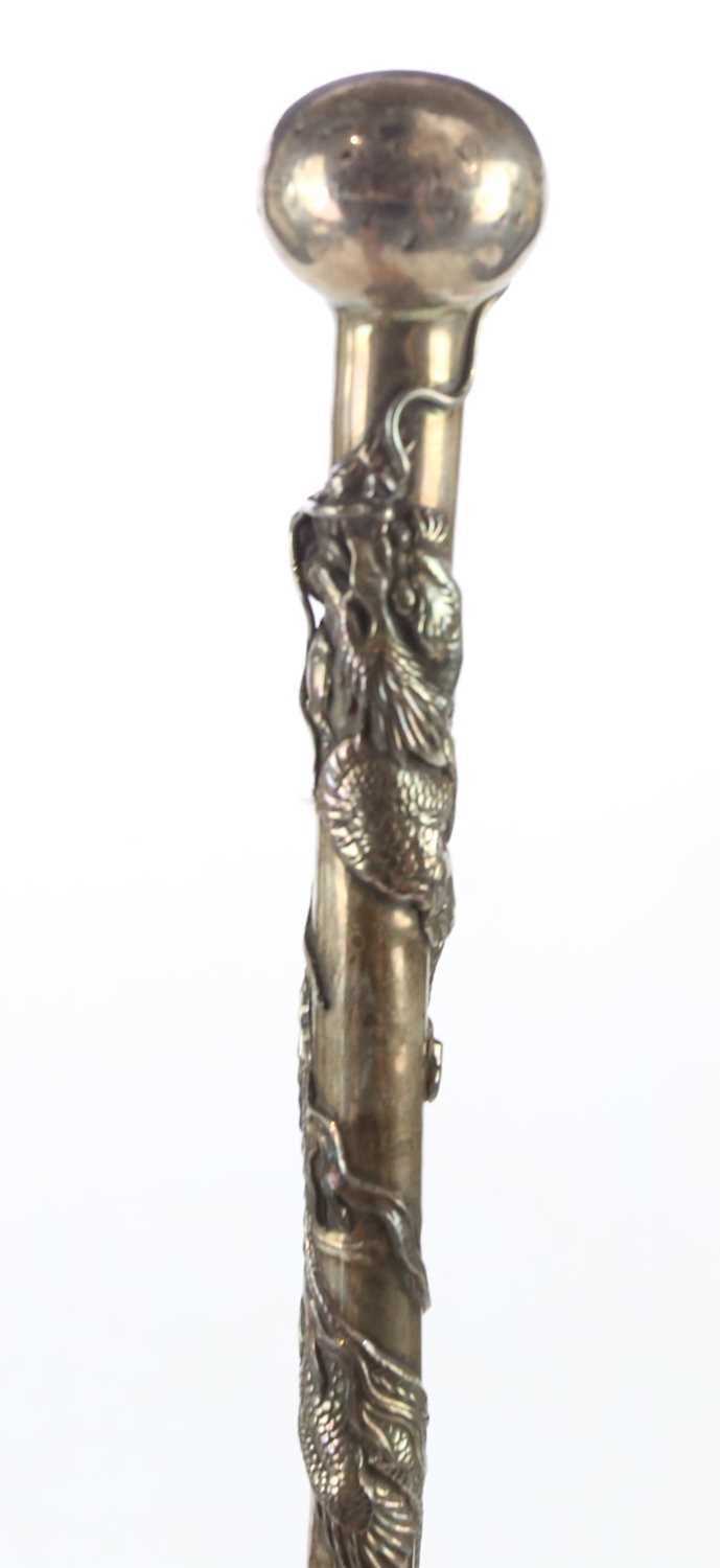 A Chinese sterling silver handled parasol with bamboo cane, the silver mount decorated with a - Image 3 of 9