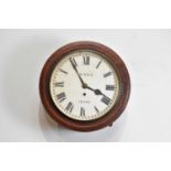 An early 20th century oak cased wall clock with fusee movement, the dial set with Roman numerals,