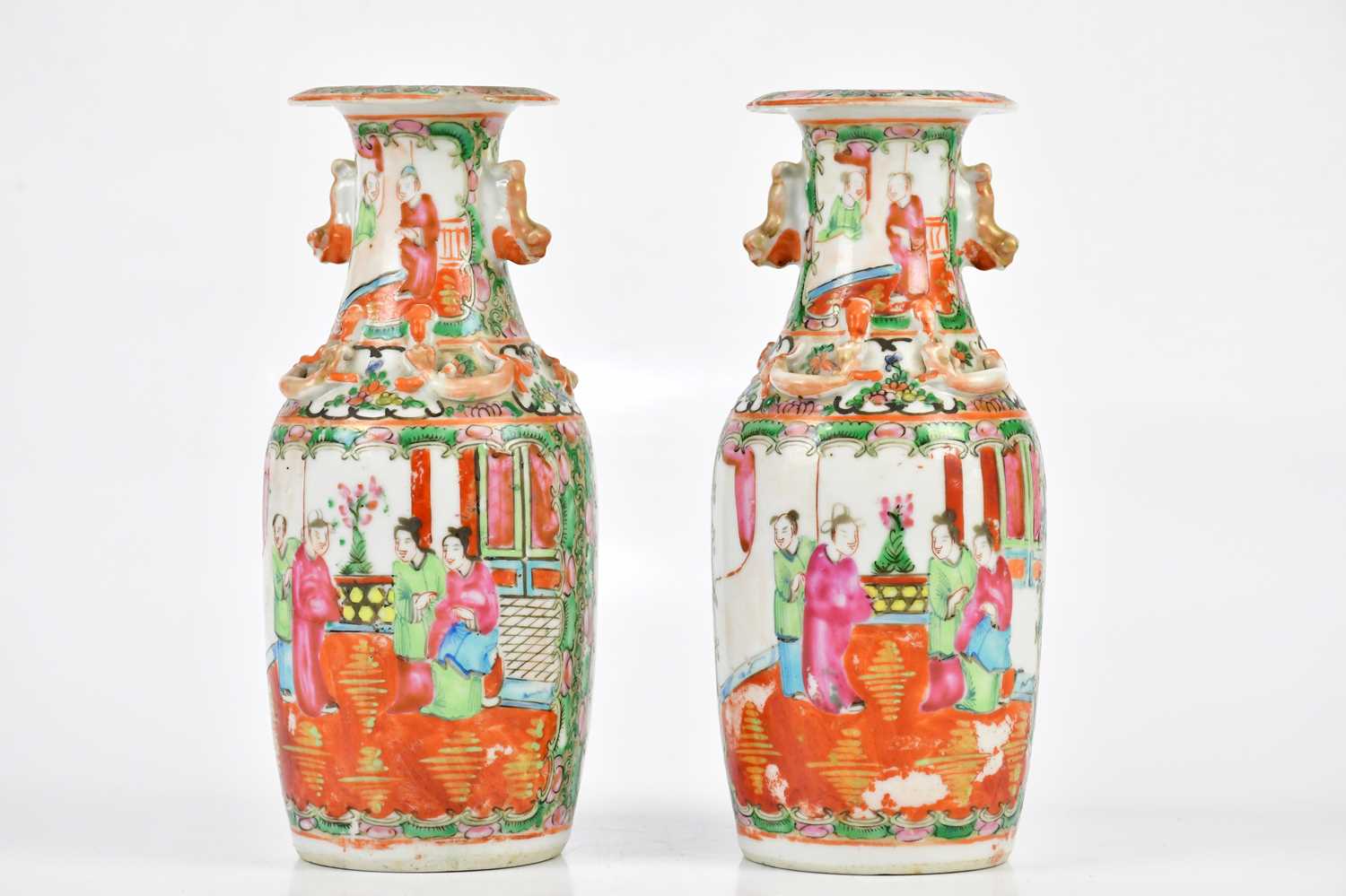 A pair of early 20th century Chinese Canton vases with moulded animal handles and climbing serpents,