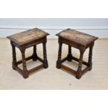 A pair of 18th century style oak joint stools, height 50cm, width 46cm.