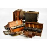 THORNTON-PICKARD; a mahogany cased ruby enlarger, with two boxes of Magic Lantern slides, nine