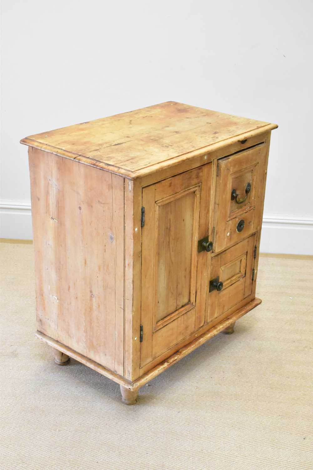 A Victorian lead lined larder cupboard with single panelled door flanked by a smaller panelled