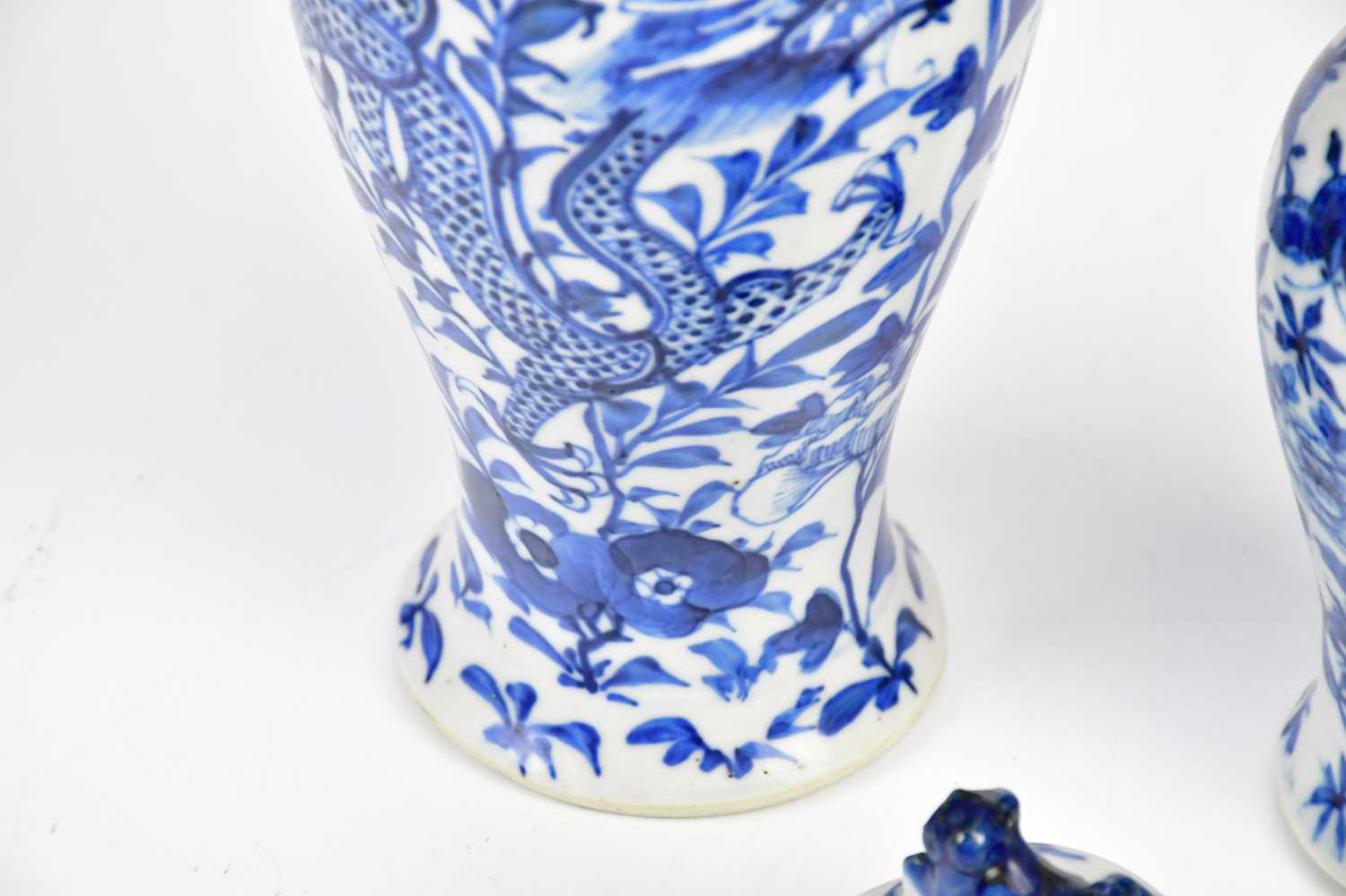 Two 19th century blue and white Chinese lidded vases and covers both with character marks to the - Image 4 of 7