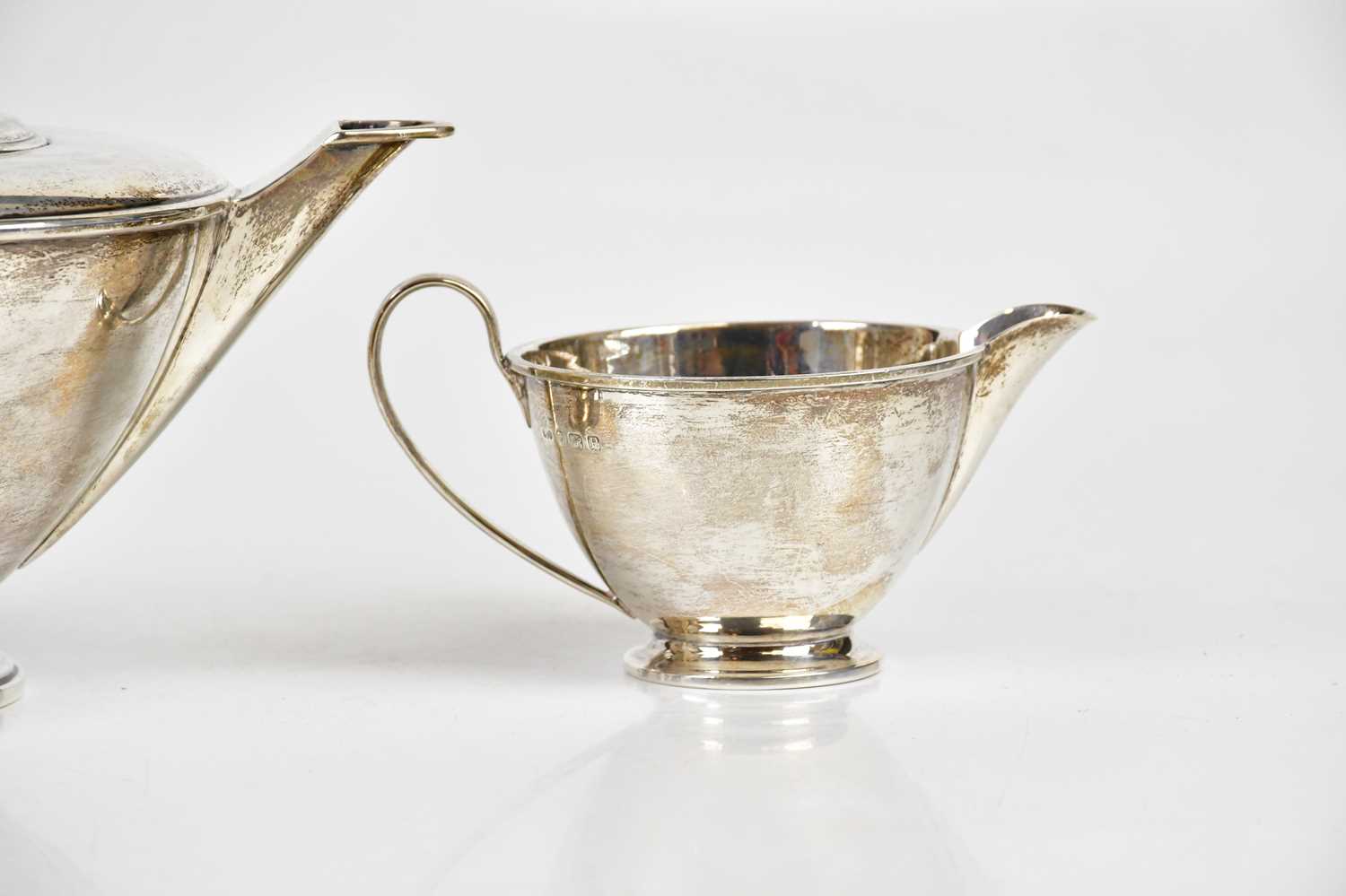 HENRY CLIFFORD DAVIS; a hallmarked silver George VI three piece tea service, Birmingham 1939, approx - Image 3 of 4