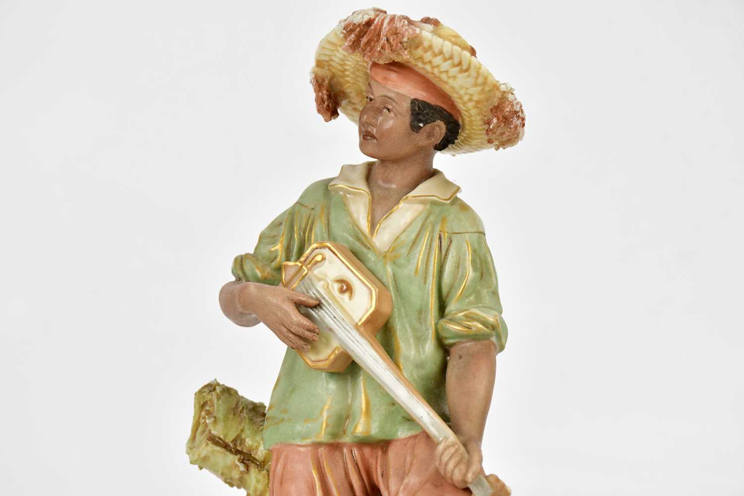 ROYAL DUX; a pair of early 20th century figures, a seated male playing a guitar and a water carrier, - Bild 2 aus 4