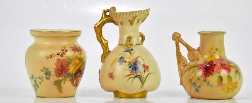 ROYAL WORCESTER; three pieces of blush ivory including a ewer with tree effect handle, numbered