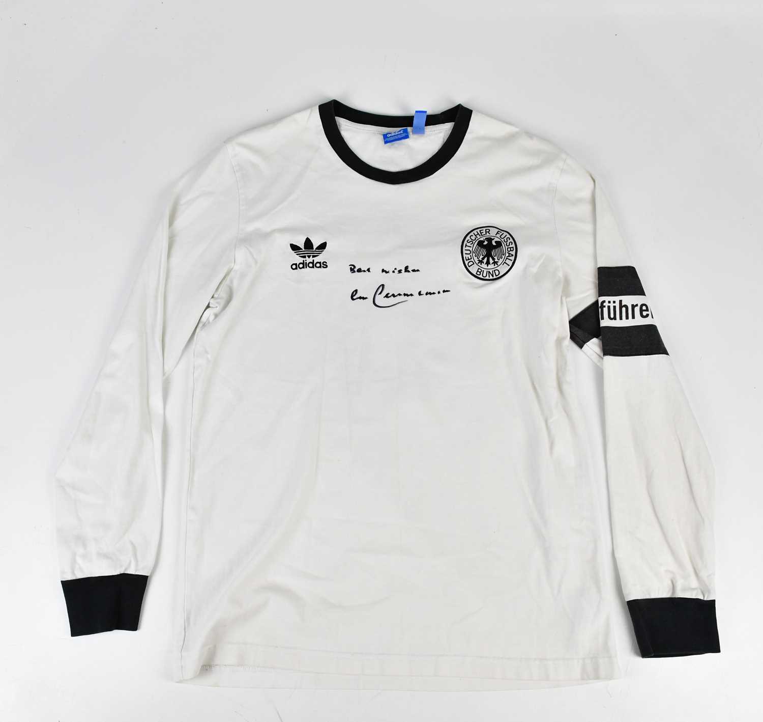 BECKENBAUER; a signed Germany retro style football shirt, signed to the front, size L. Condition