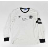 BECKENBAUER; a signed Germany retro style football shirt, signed to the front, size L. Condition