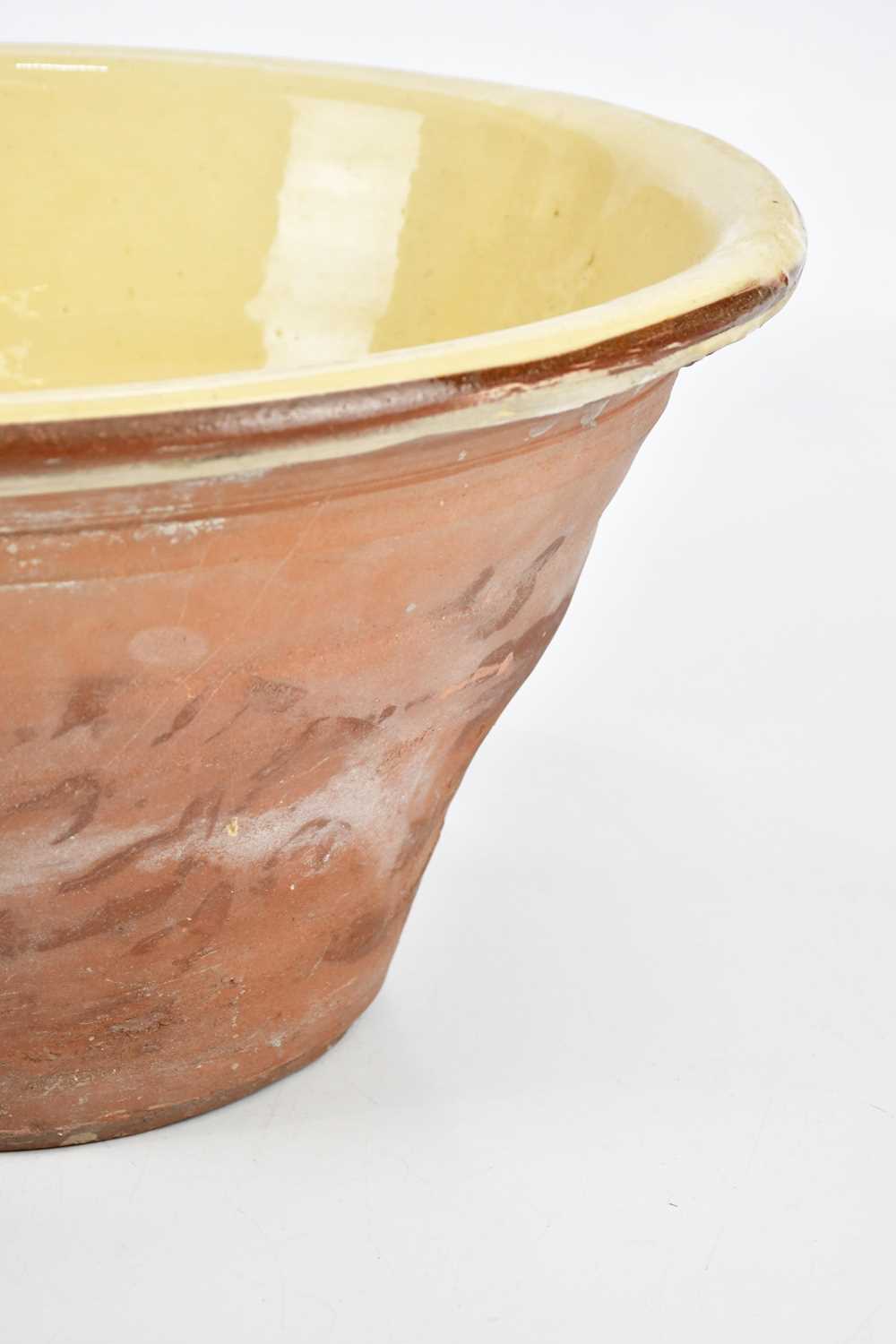 A large slipware terracotta dairy bowl, height 22cm. - Image 3 of 6
