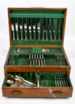 An early 20th century part canteen of plated cutlery.