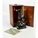 BECK, LONDON; a model 4196 cased microscope, height 43cm.