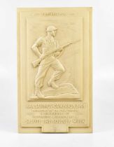 A WWII ivory coloured bakelite wall plaque, "War Savings Campaign 1944, presented by the War