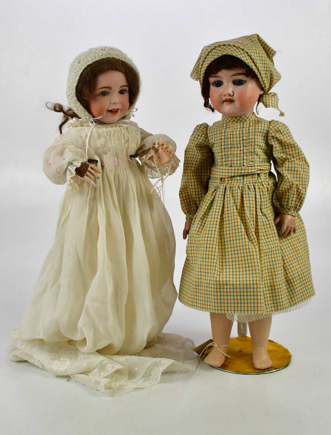 ARMAND MARSEILLE; a German bisque headed doll with sleeping eyes, impressed '390' verso, with