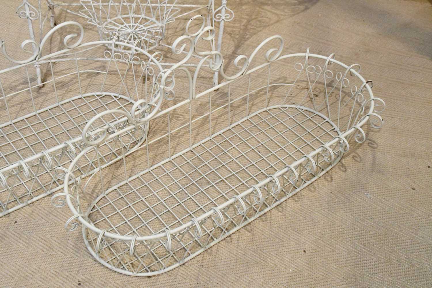 A white painted wirework garden planter, height 78cm, and two similar modern wall hanging wirework - Image 3 of 4