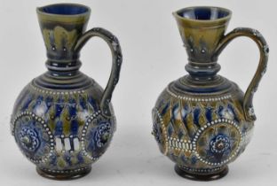 DOULTON LAMBETH; a pair of 19th century jugs, height 16cm.