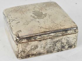 A hallmarked silver cigarette box, inscribed with Duchy of Cornwall crest and 'One and All' to