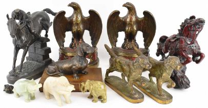 A group of decorative modern spelter and resin figures, including a pair of brass figures of dogs, a