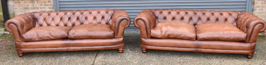 A pair of modern brown leather button upholstered Chesterfield three seated settees, width approx