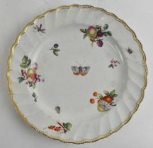 CHELSEA DERBY; a shallow bowl painted with fruits and central butterfly, diameter 22.5cm.