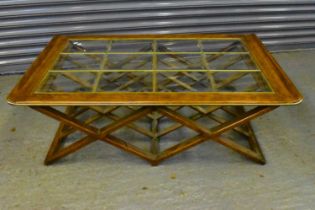 A reproduction oak and brass bound rectangular coffee table, the top inset with twelve bevelled