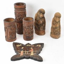 A group of three Chinese carved hardwood brush pots, height of tallest 30cm, two Chinese hardwood