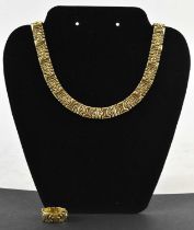 An 18ct yellow and white gold necklace, length 42.5cm, together with a matching 18ct yellow and