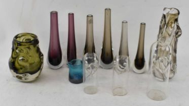 WHITEFIARS; a graduated set of three abstract glass models of ducks, a group of six teardrop bud