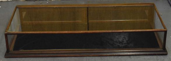 A mahogany framed table top jeweller's showcase display cabinet with twin hinged flaps, 117 x 48.