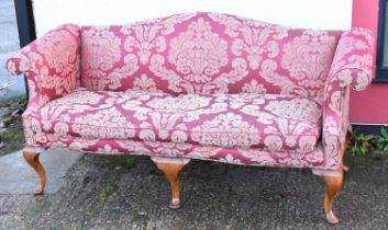 A reproduction Queen Anne style upholstered sofa on cabriole supports, width approx 195cm.