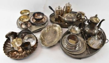 A large quantity of silver plated items including two large silver plated trays, a pair of coffee