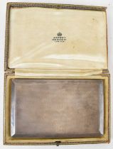 ASPREY & CO LTD; a cased George V hallmarked silver cigarette case, London 1932, 13.5 x 8cm,