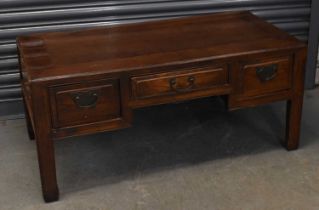 A Chinese hardwood three drawer coffee table, width 111cm.