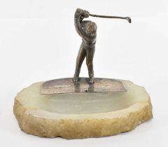 GOLF INTEREST; a mid 20th century hallmarked silver gilt trophy depicting a golfer on onyx base,